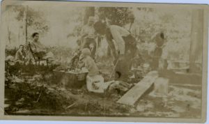 Thaddeus Sobieski Snyder watching son, Thad Allen Snyder at gather on Miami Farm