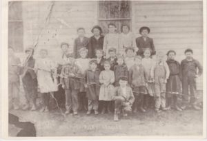 At Georgia City School: Stephan Henry Keck with siblings at school