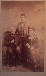 Sarah Louise Baker with brothers Clarence Edward Baker seated and Morris Cutler Baker standing